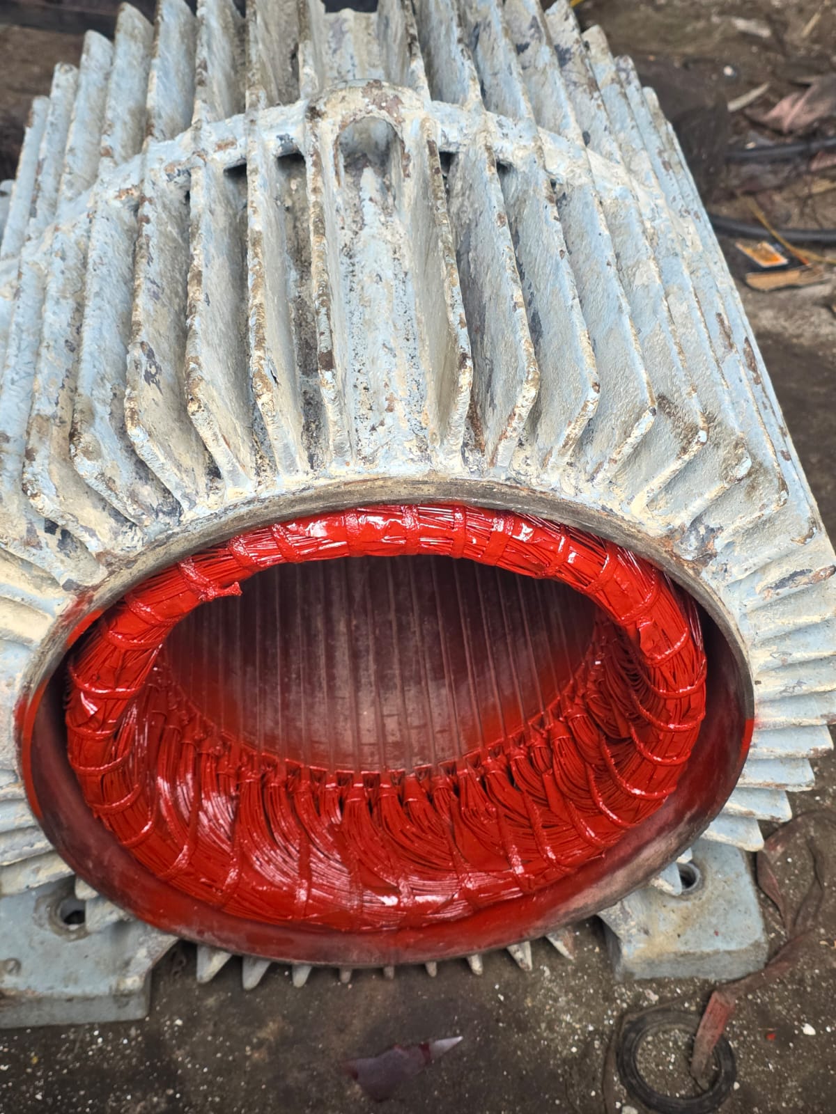 Rewound motor with red Class C insulation in finned housing